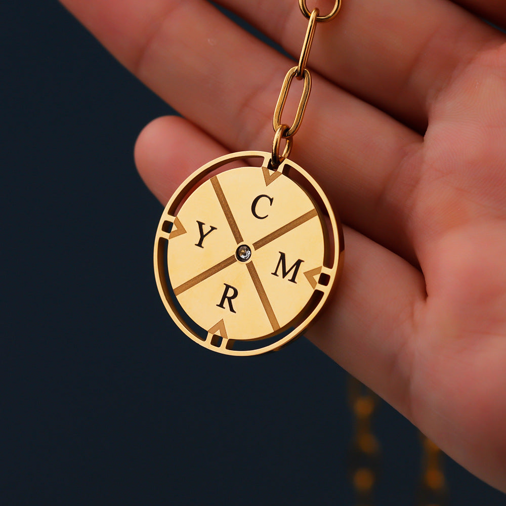 Compass style engraved necklace